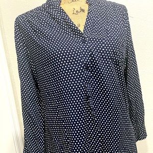 V-neck blue and white polka dot blouse